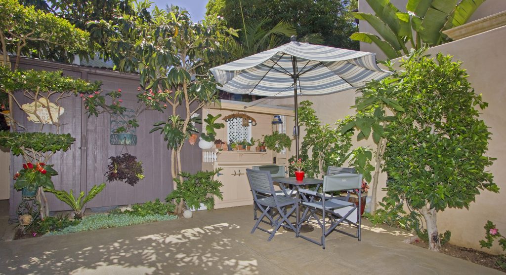 sitting, outdoor, backyard, umbrella, plants, table, garden